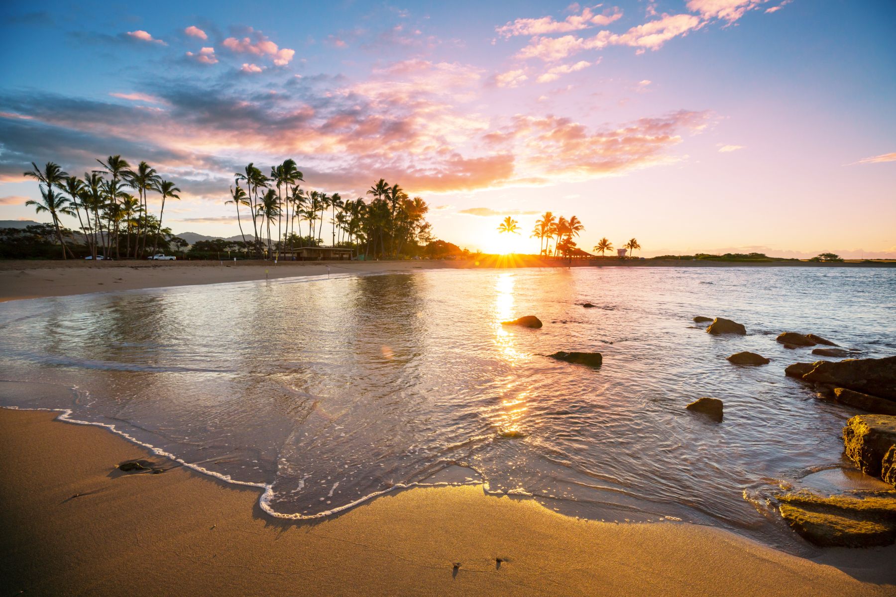 shutterstock_1662957937 header 0323 | Kauai Calls sunrise on the beach in kauai